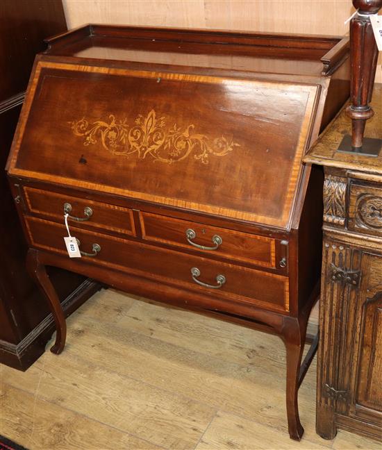 An Edwards and Roberts marquetry inlaid mahogany bureau W.89cm